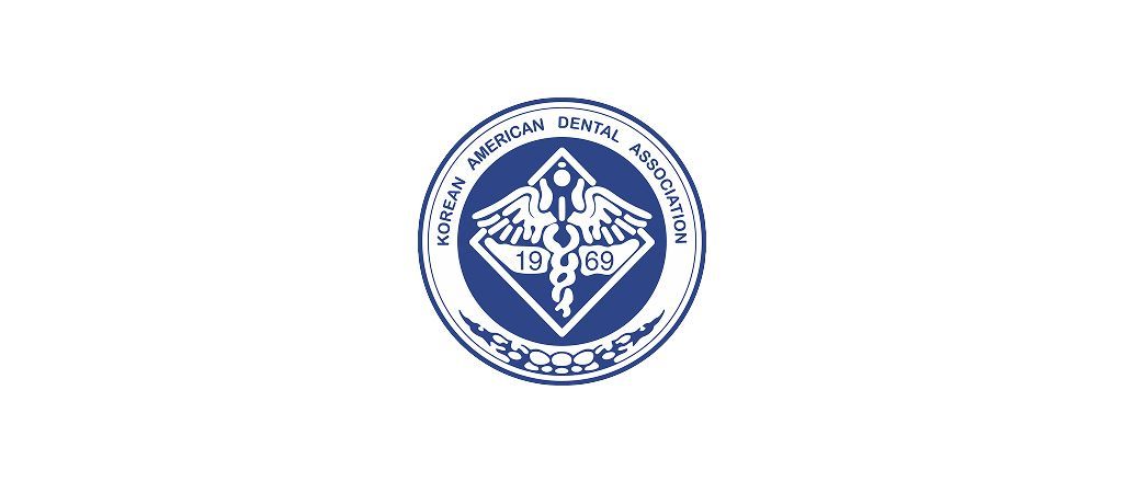 Blue circular emblem with a diamond-shaped center and surrounding text