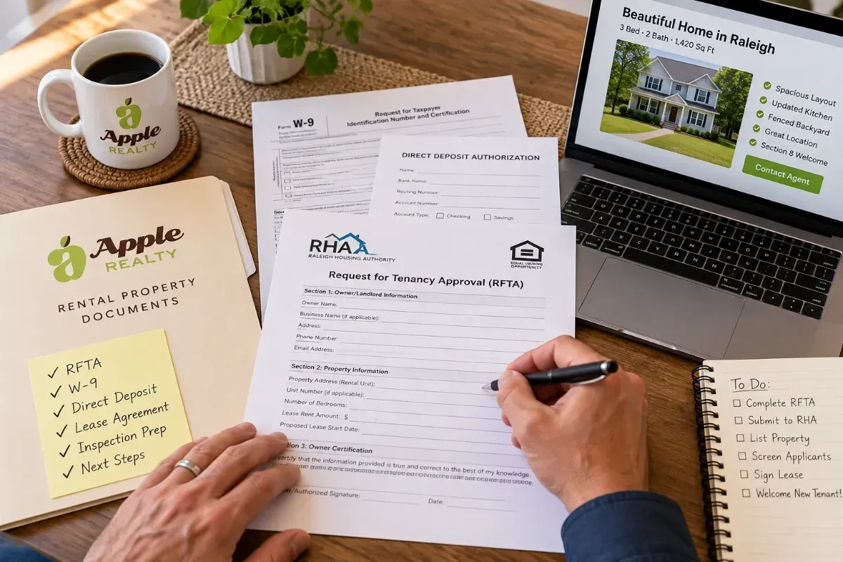 Owner completing a Request for Tenancy Approval packet at a kitchen table with a laptop and rental file