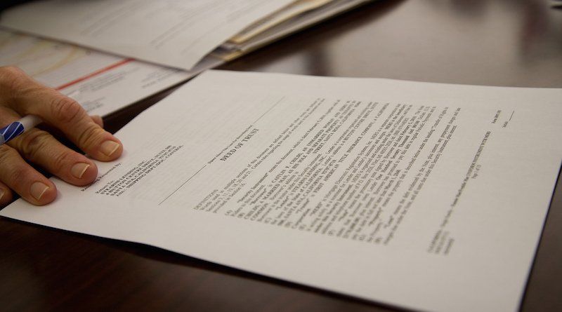 Signing paperwork Signing paperwork