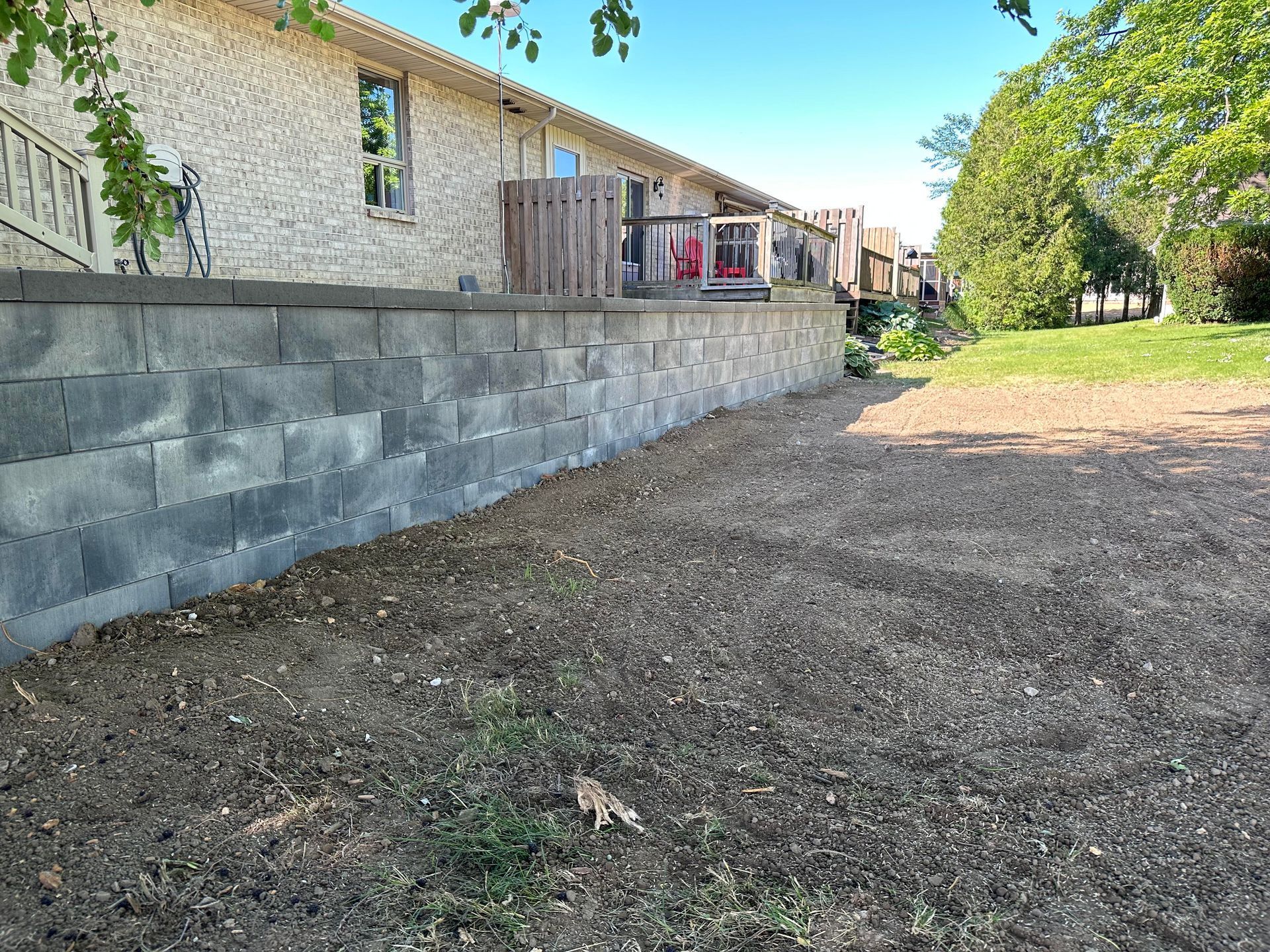 An aerial view of a driveway in front of a house.