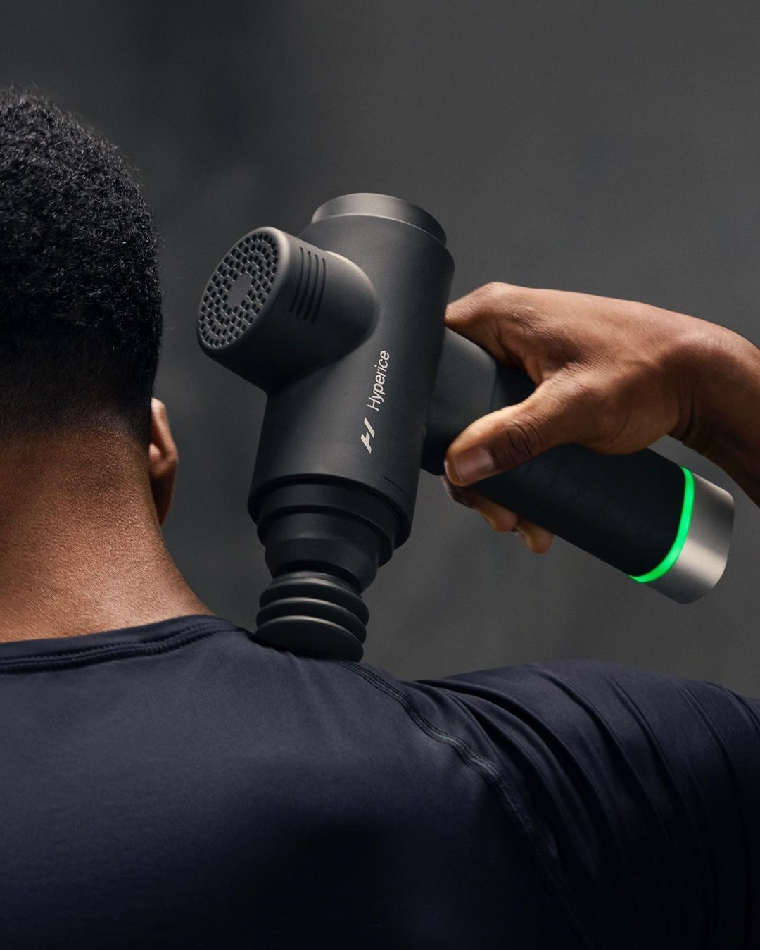 A physical therapy massager in use on a patient's back as part of pain management therapy, aiming to reduce discomfort through exercises, manual techniques, and education, minimizing the reliance on pain medication.
