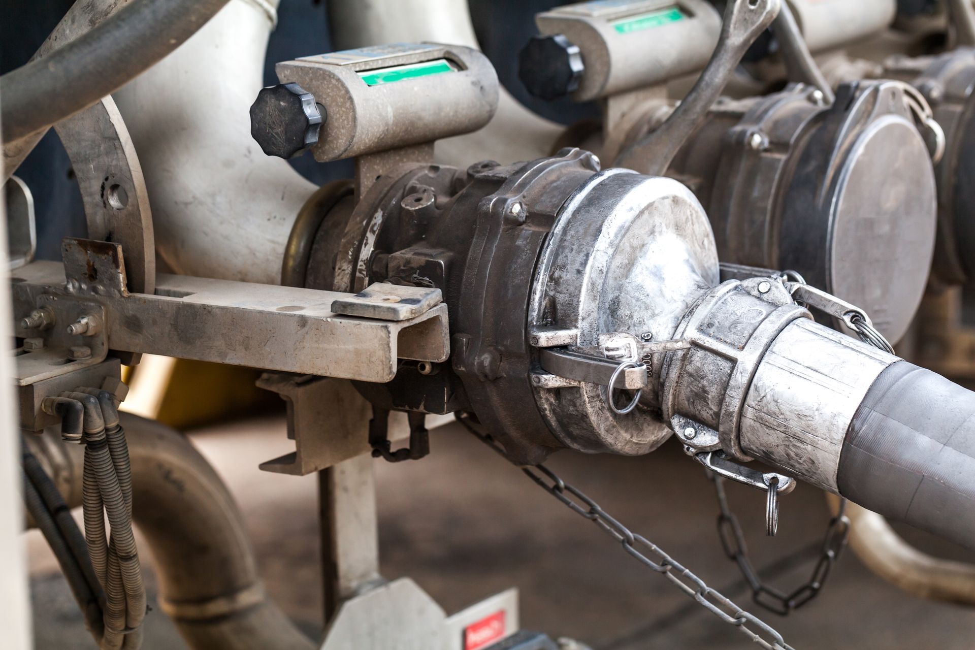 Close-up Of Industrial Hoses And Connectors, With A Chain, Attached To Machinery — Resurge Diesel & Fabrication Pty Ltd In Balnagowan, QLD