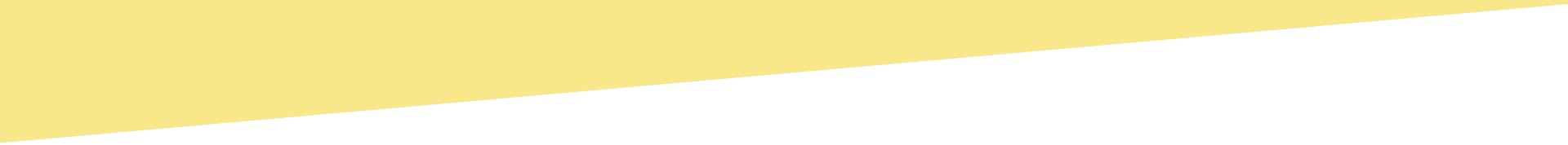 A piece of yellow paper is ripped in half on a white background.