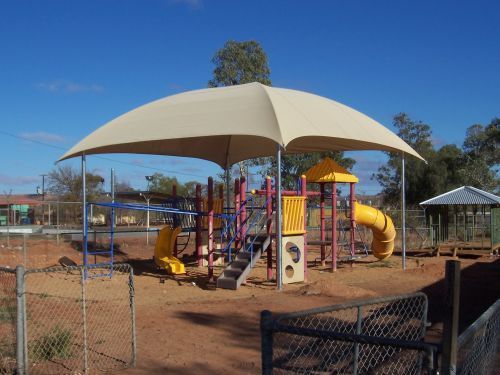 A Shade Sail Umbrella Over A Playgound — Shadetech in Alice in Ciccone, NT