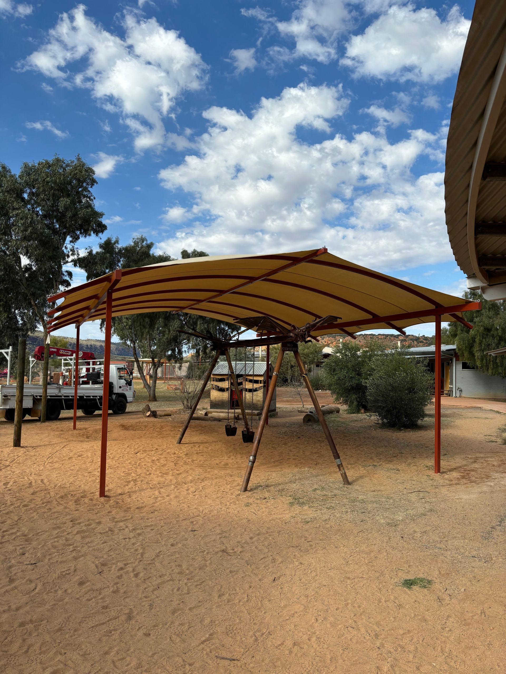 A Shade sail  Covering A Swing Set— Shadetech in Alice in Ciccone, NT