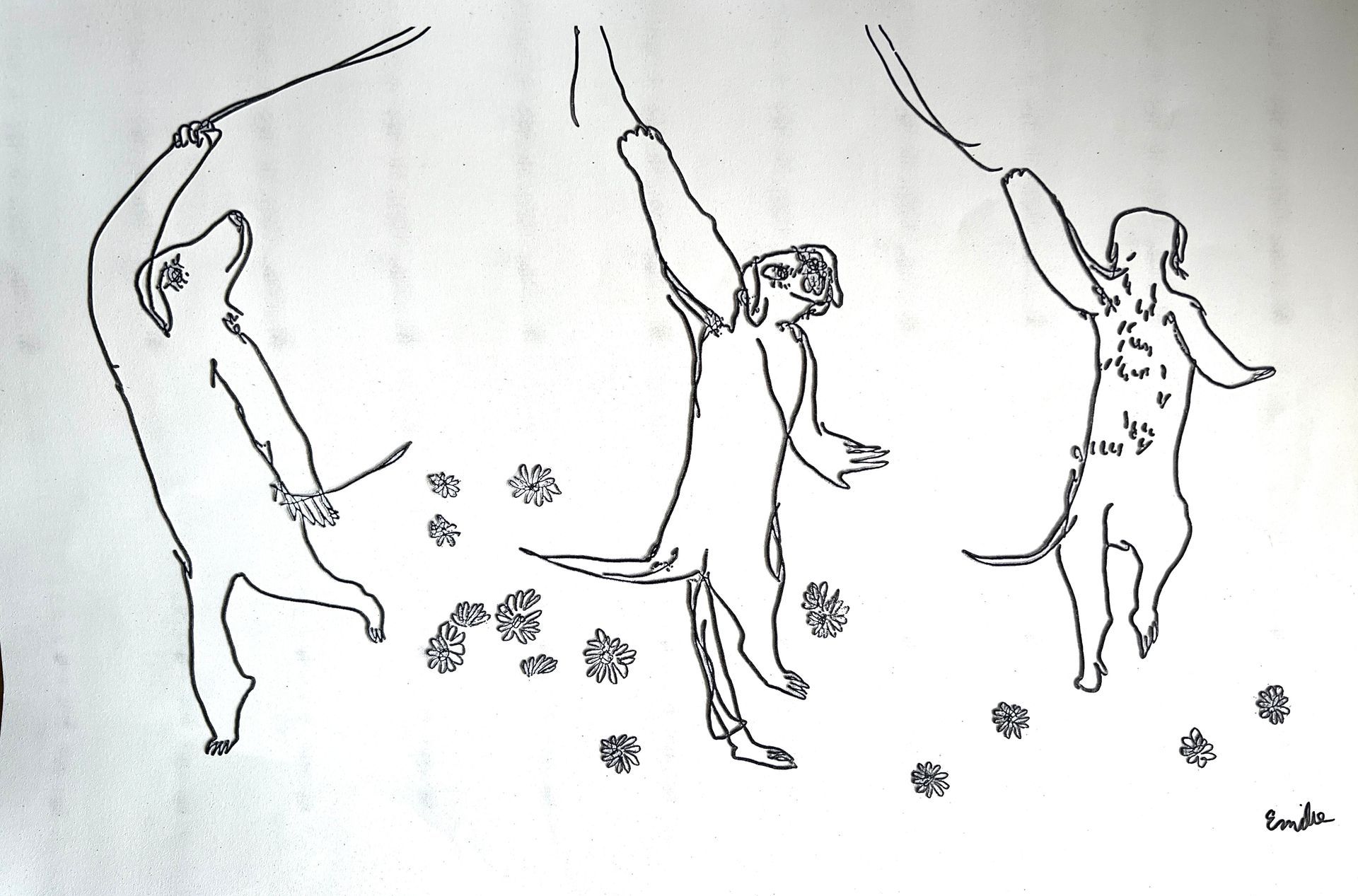 A black & white photo of three dogs with their paws reaching upward to grab onto strings.  In between the dogs are flowers. 