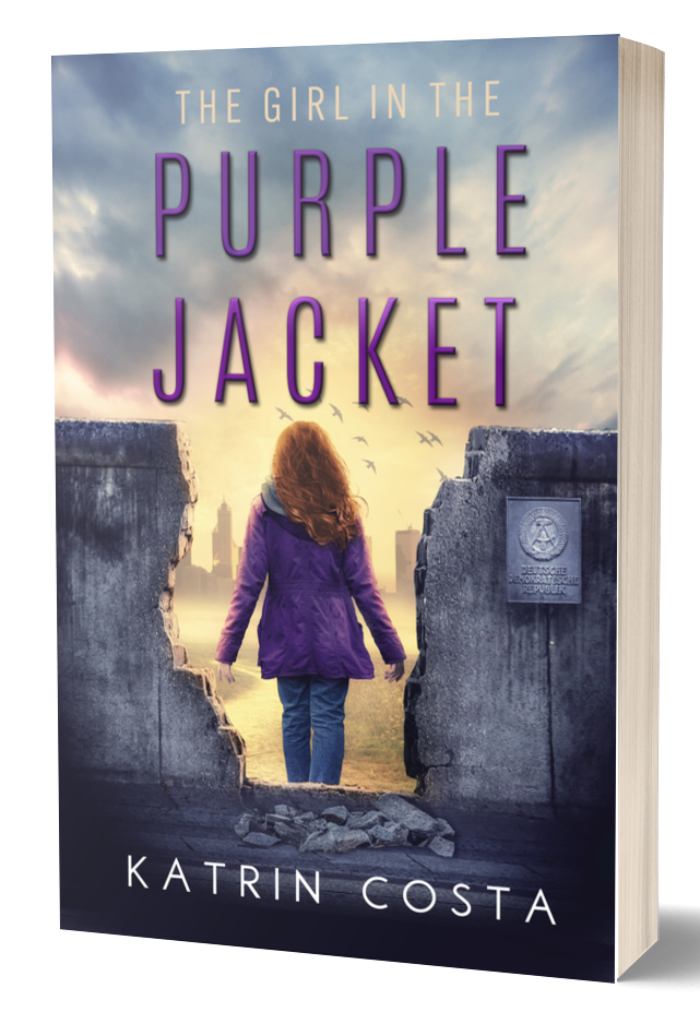 Book cover of The Girl in the Purple Jacket by Katrin Costa, showing a girl in a purple coat walking down a path