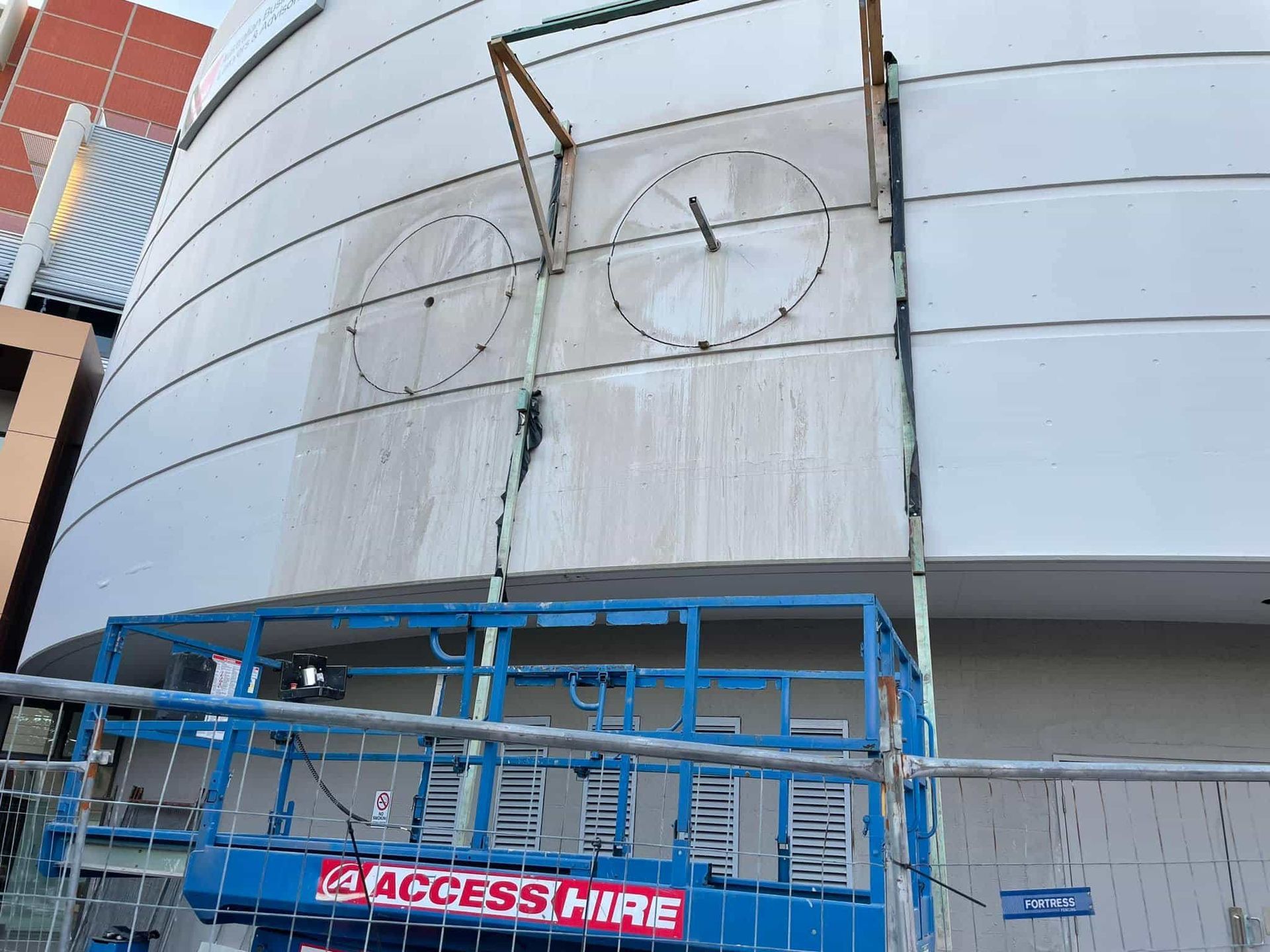 A large building with a sign that says access hire — Newcastle Cut & Drill In Boolaroo, NSW