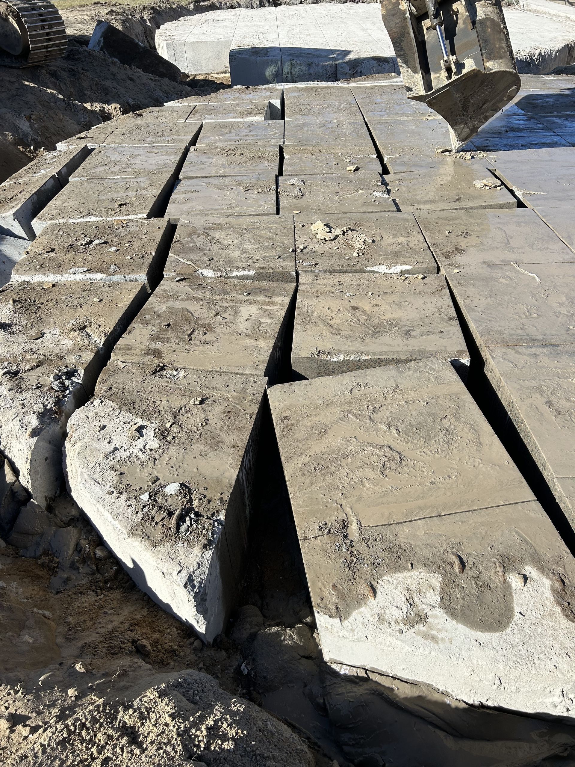 A Concrete path cut up and ready for removal— Newcastle Cut & Drill In Boolaroo, NSW