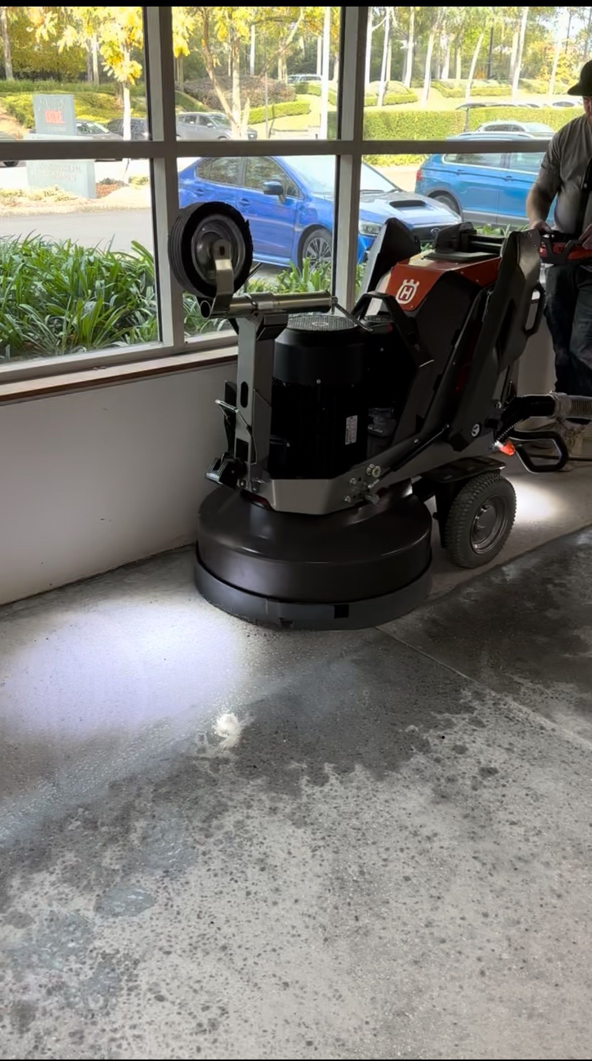 Grinding the cement floor inside a building — Newcastle Cut & Drill In Boolaroo, NSW