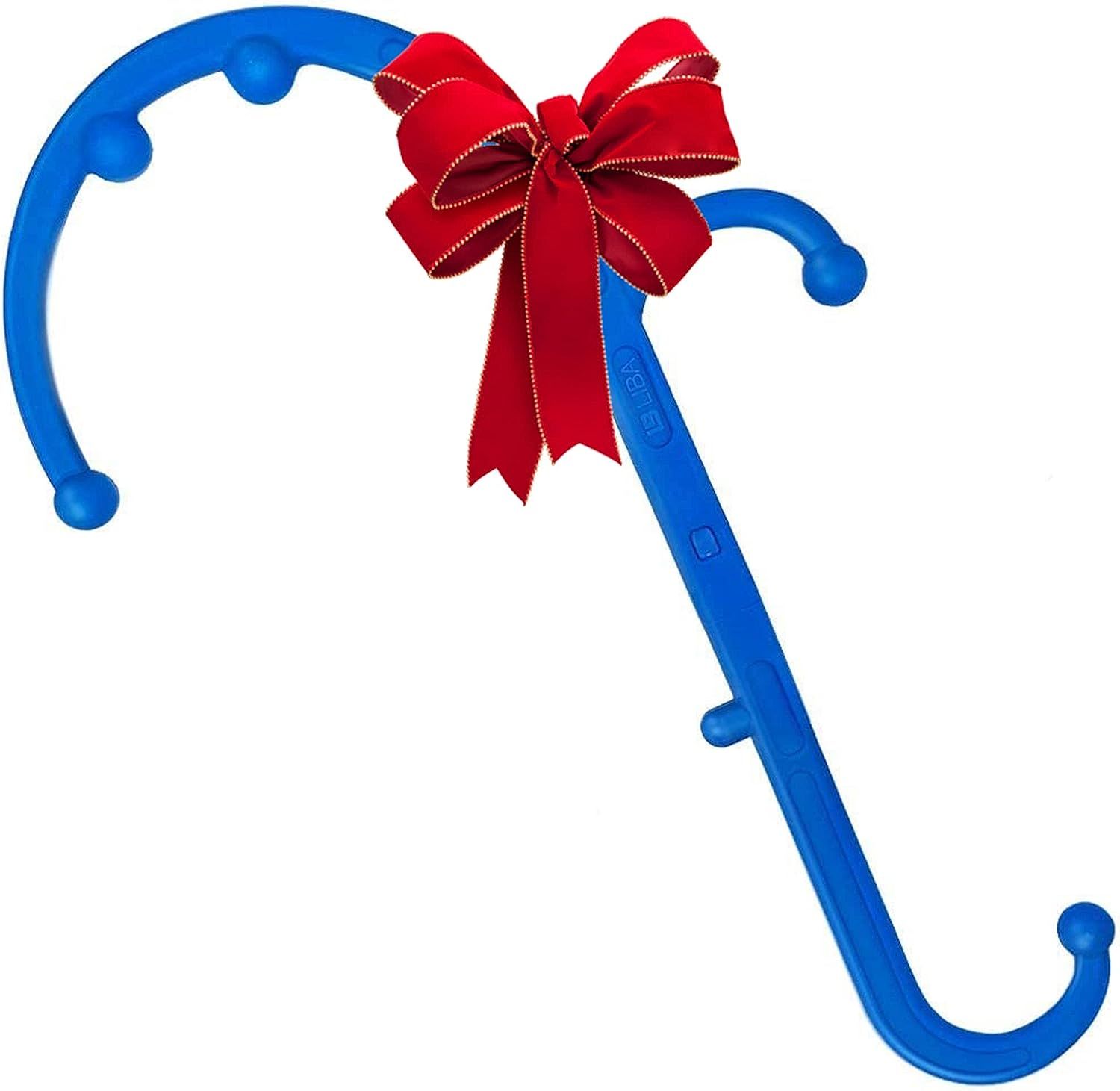 A blue massage tool with a red bow on it
