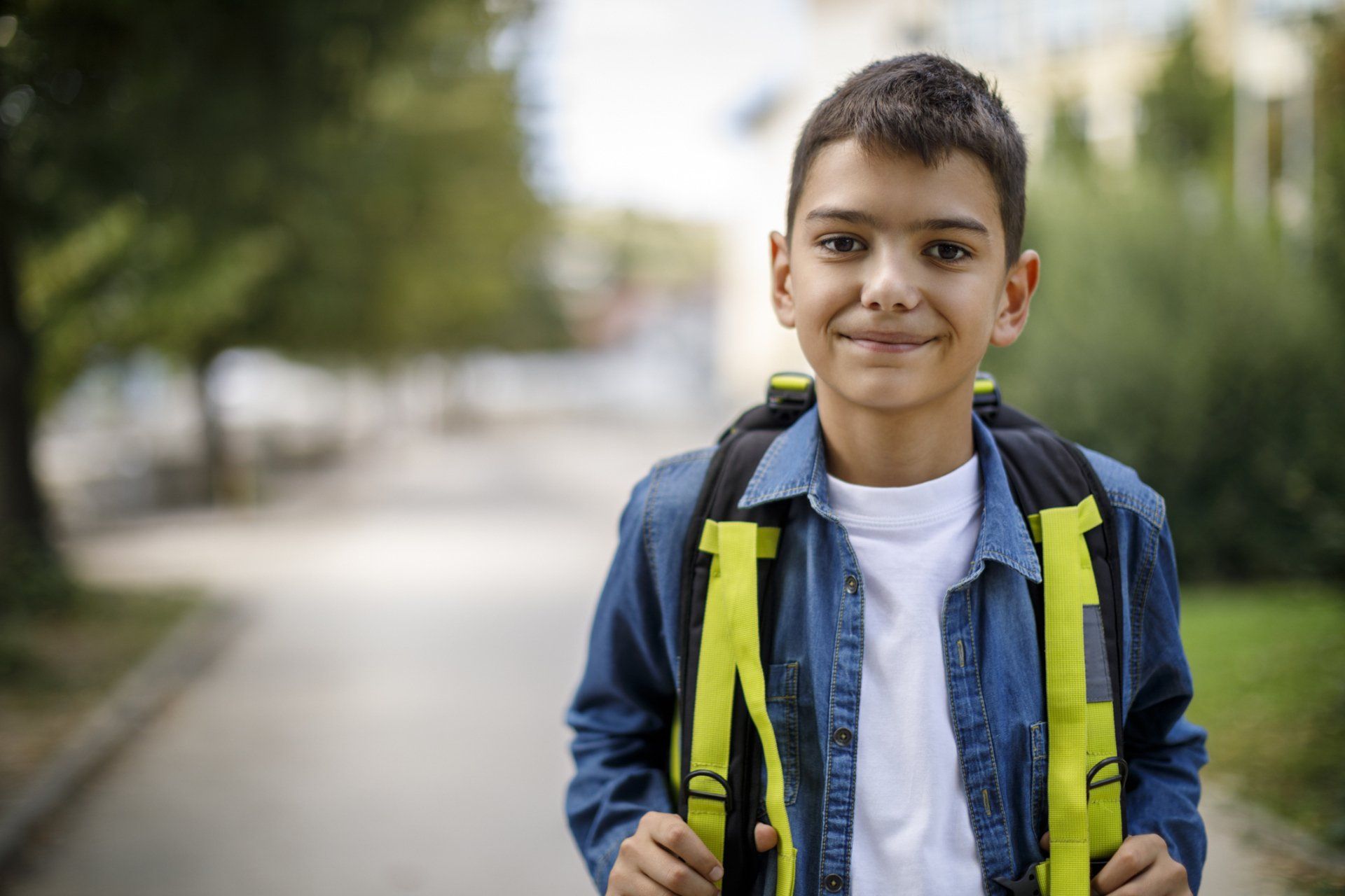 Smiling Boy With School Bag — Cheektowaga, NY — Century-Airport Pediatrics, P.C.