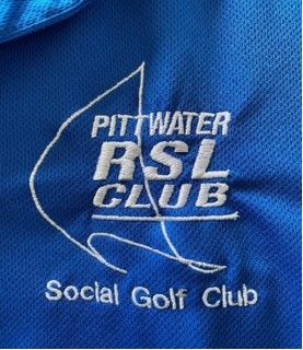 Close-up of embroidered RSL club logo displayed on a blue shirt