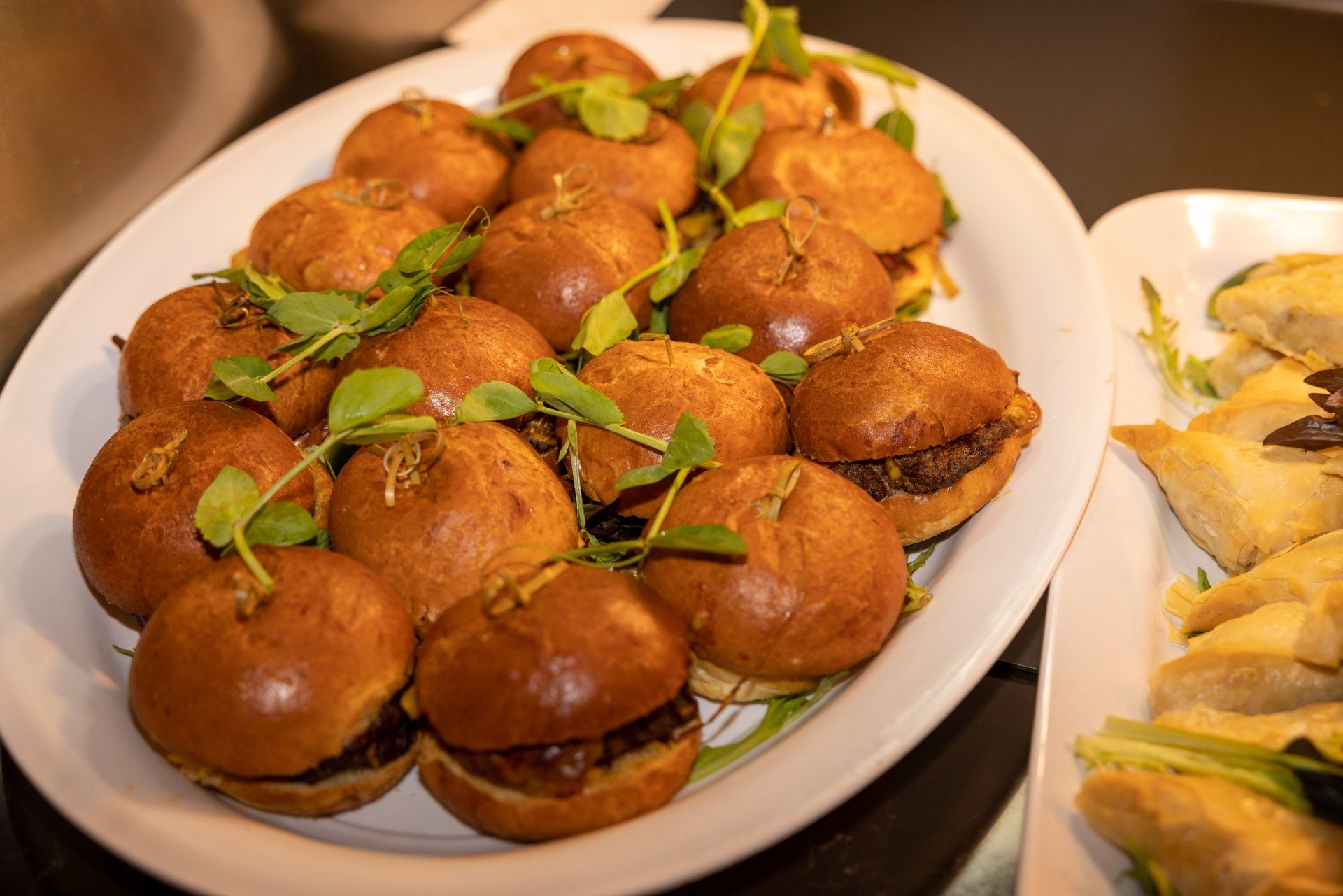 Catering platter of gourmet sliders served at a social function at Mona Vale RSL Club