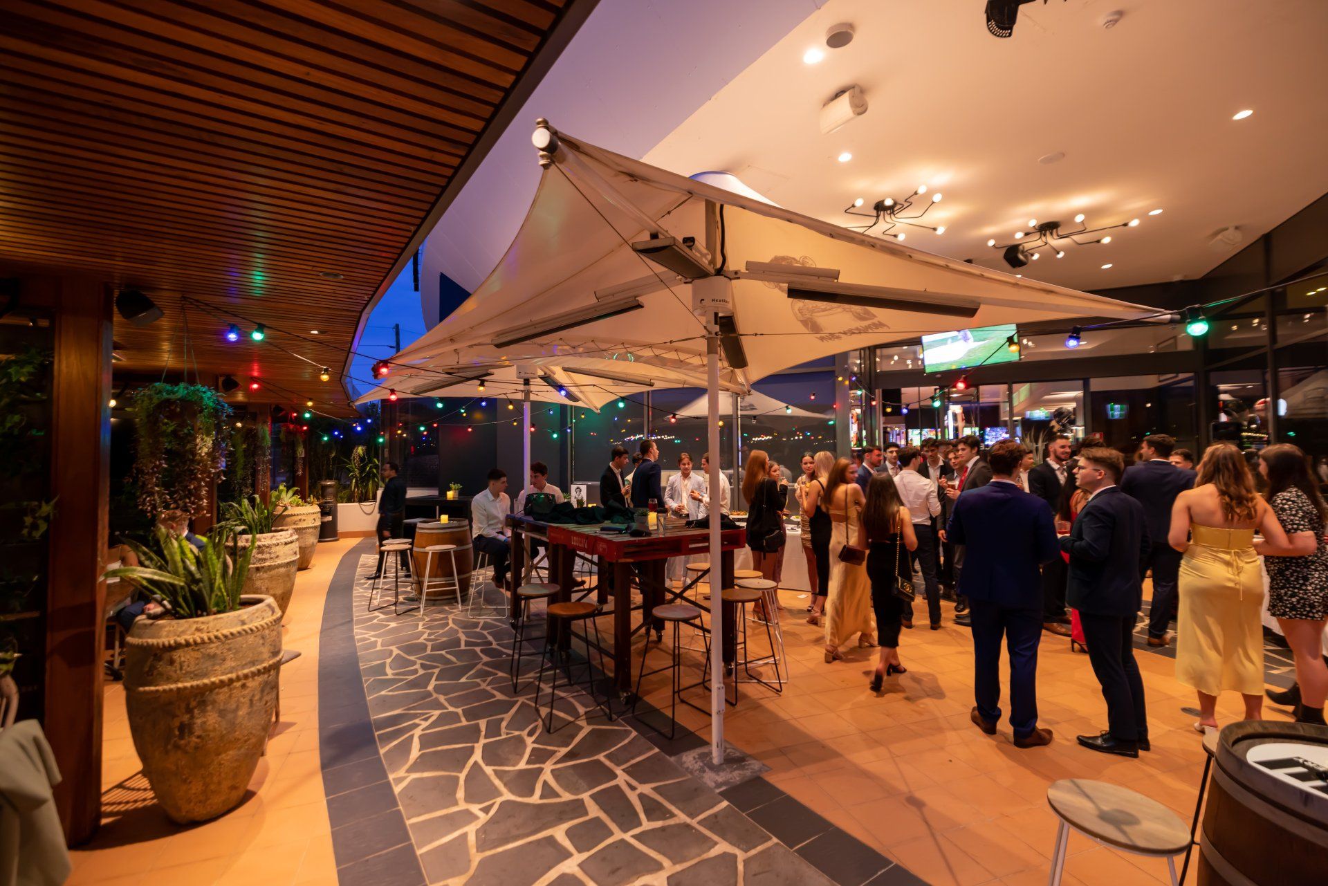 Indoor–outdoor function space set up for a social event at Mona Vale RSL Club
