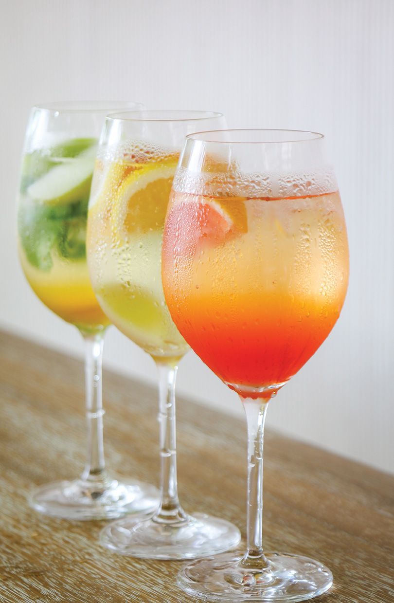 Refreshing spritz cocktails served in tall glasses for summer events and packages