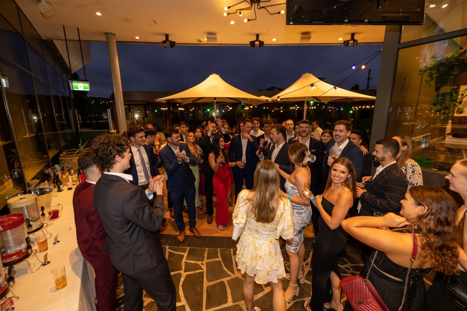 Evening social function with guests networking on the terrace at Mona Vale RSL Clu