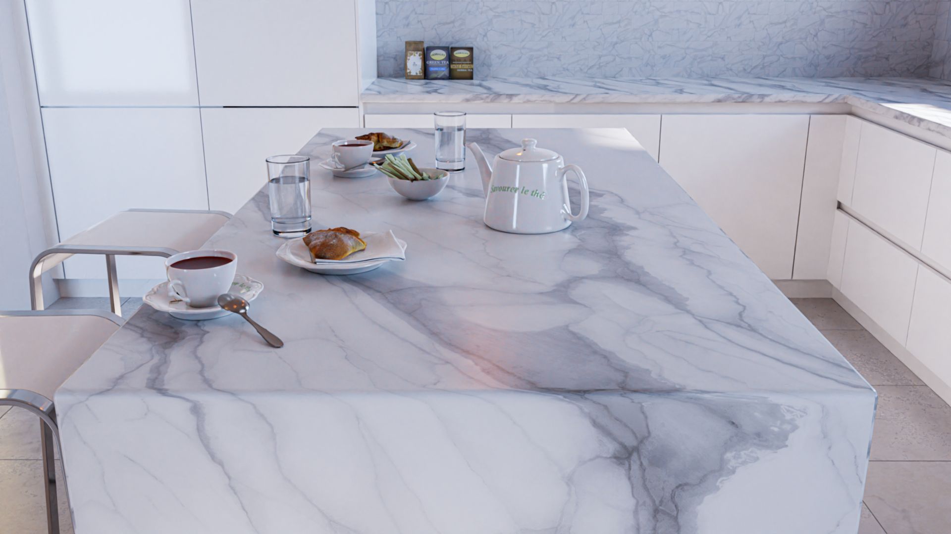 Kitchen island with marble countertop and breakfast items.