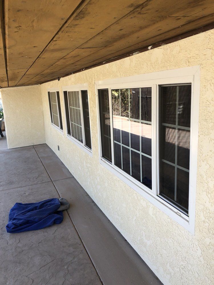 A row of windows on the side of a building.
