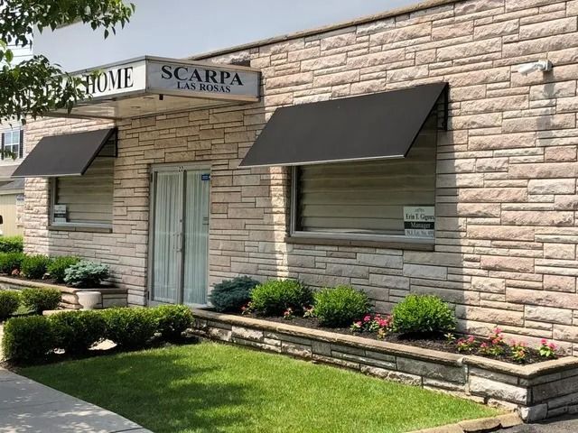 A single-story stone building with a