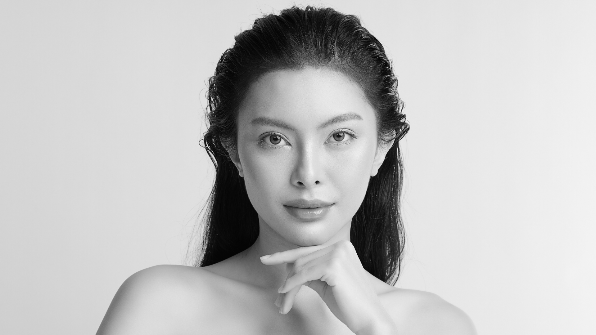 A black and white beauty portrait representing wrinkle-relaxing treatment at MAX MD
