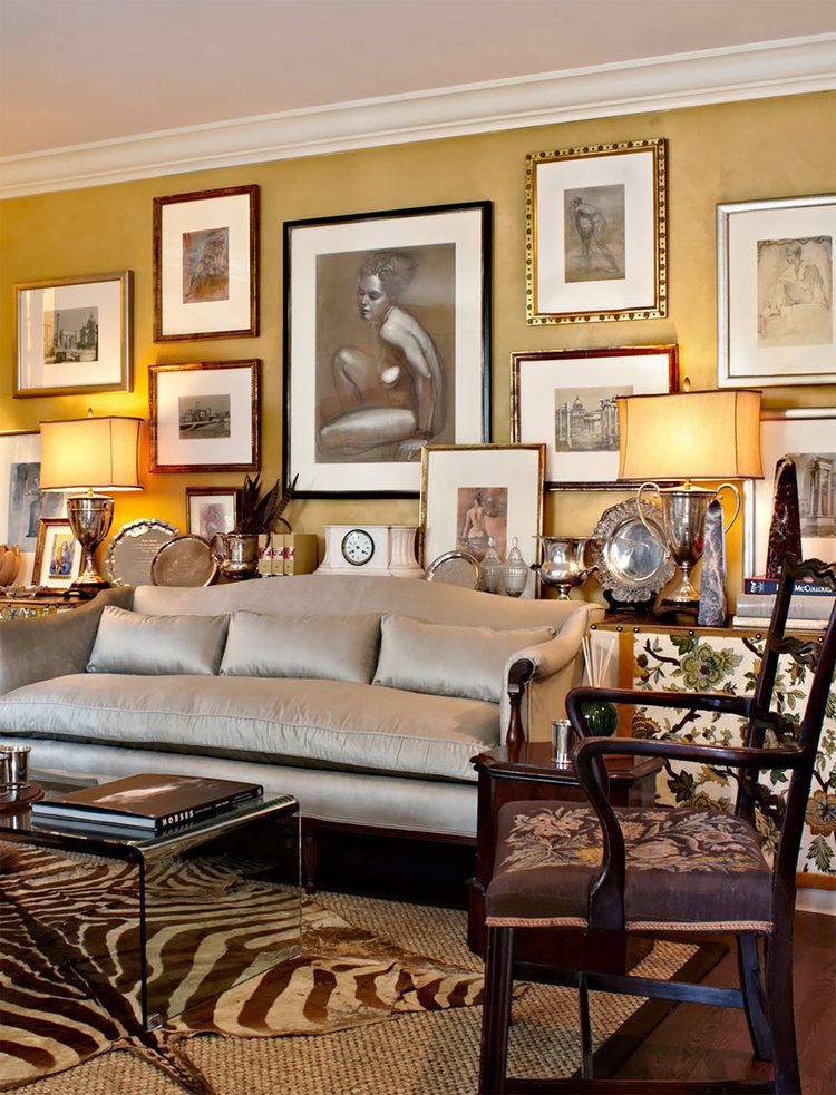 Colorful abstract mural on a brick wall, featuring wavy patterns in various bright hues.