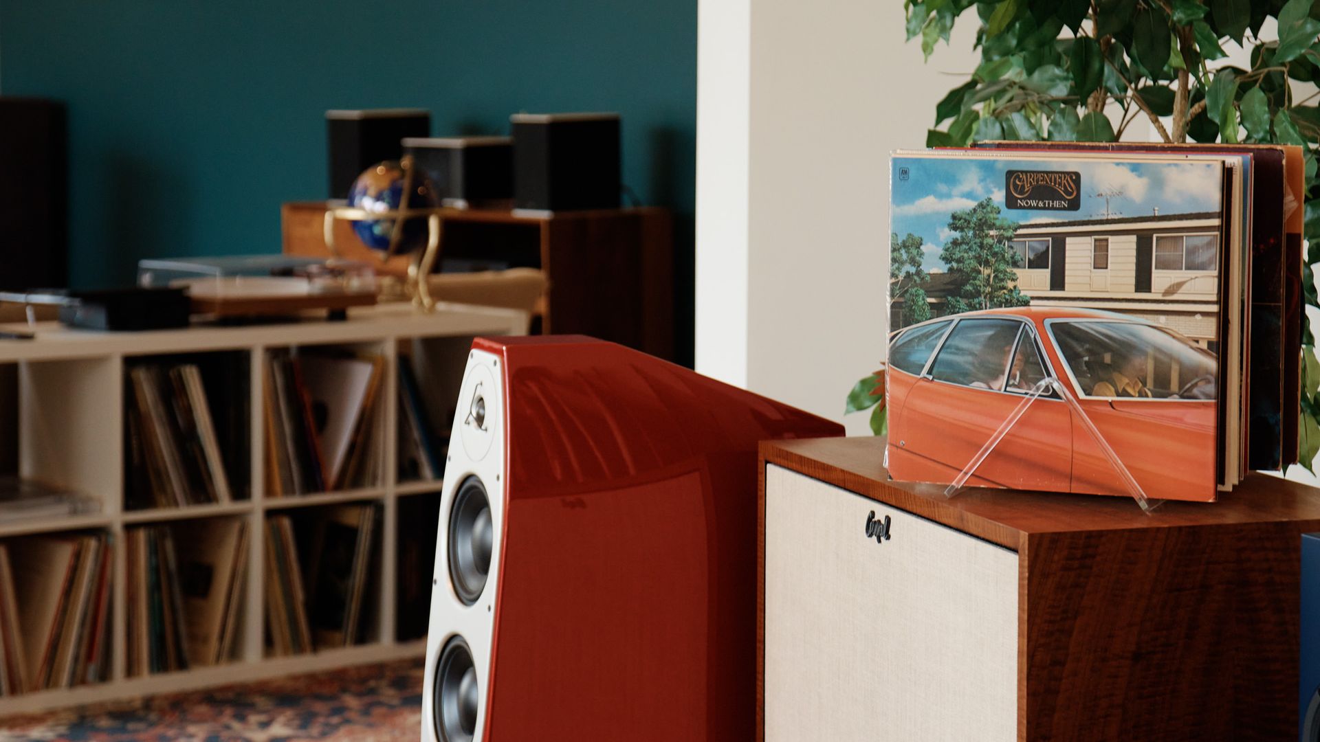 Person pointing at paint color swatches.