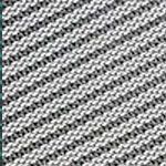 Close-up of a diagonal striped pattern with alternating white and gray woven threads.