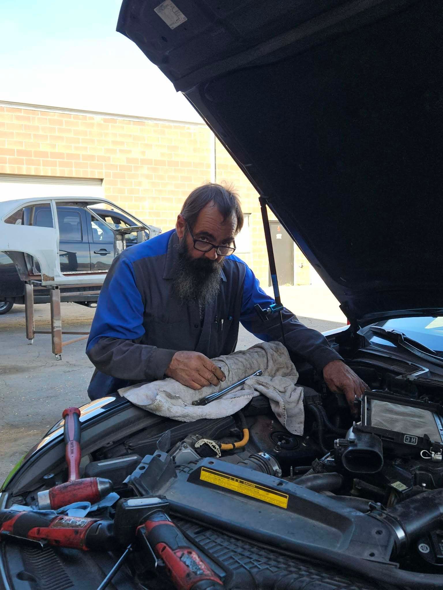 Mechanic Doing Maintenance | CT Auto Powered by Pete’s Autoworks