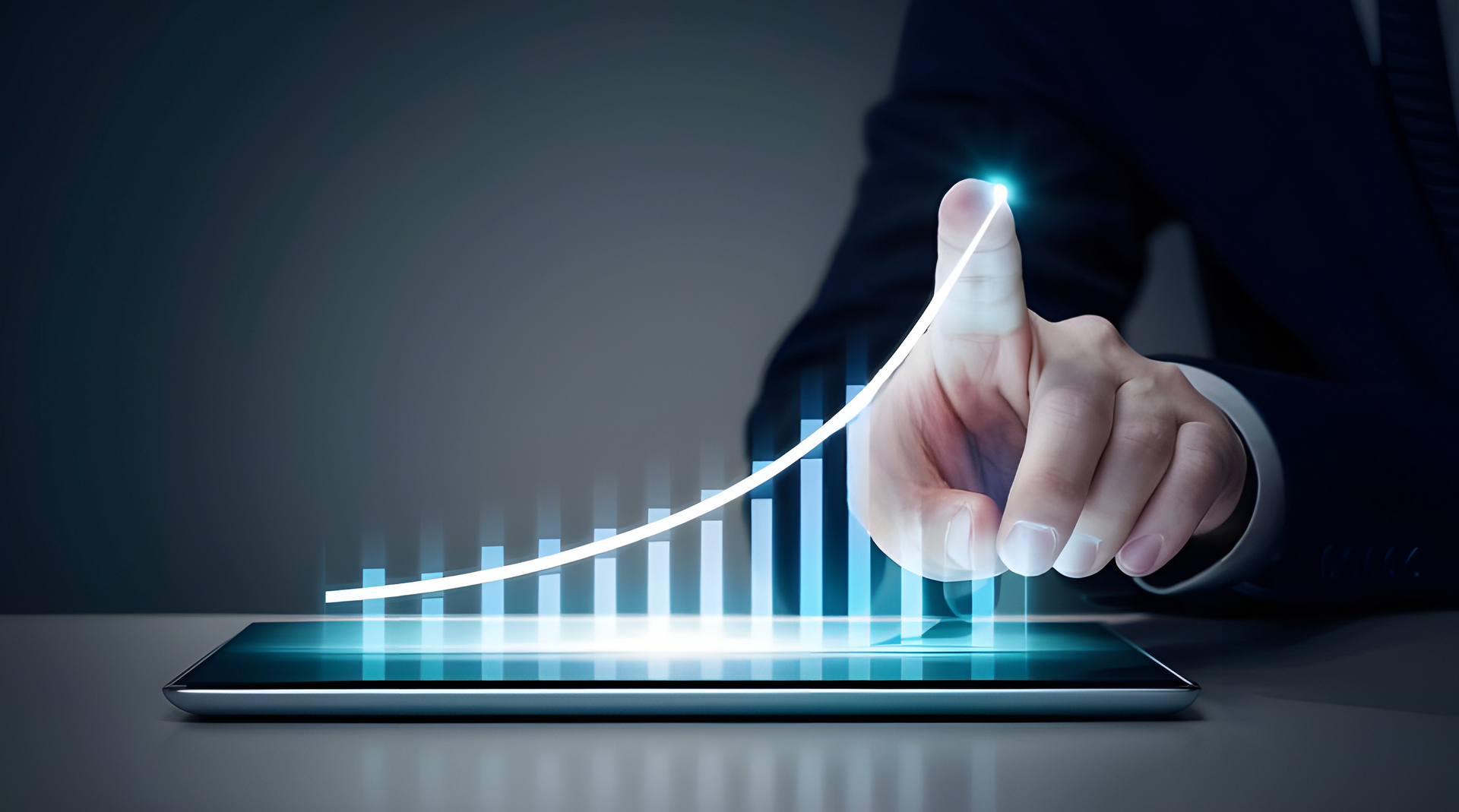 A person is pointing at a graph on a tablet.