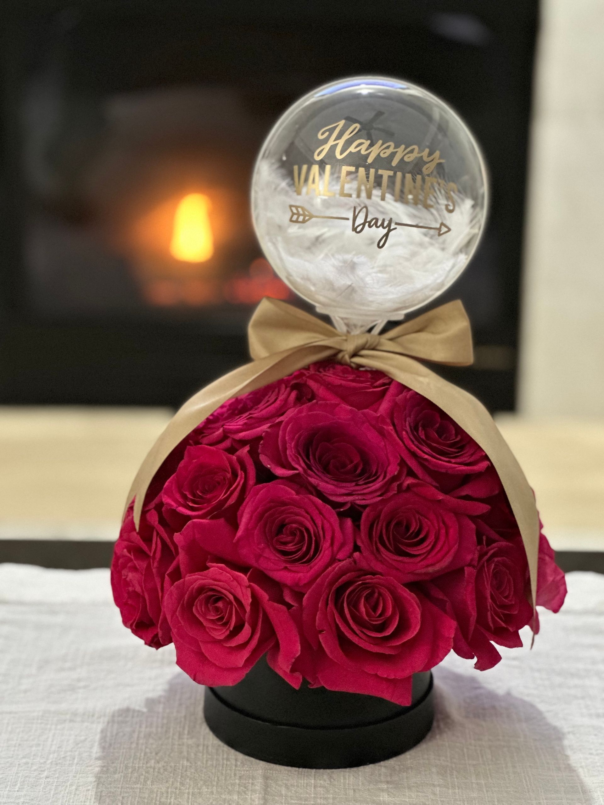 Red roses in a black box with a