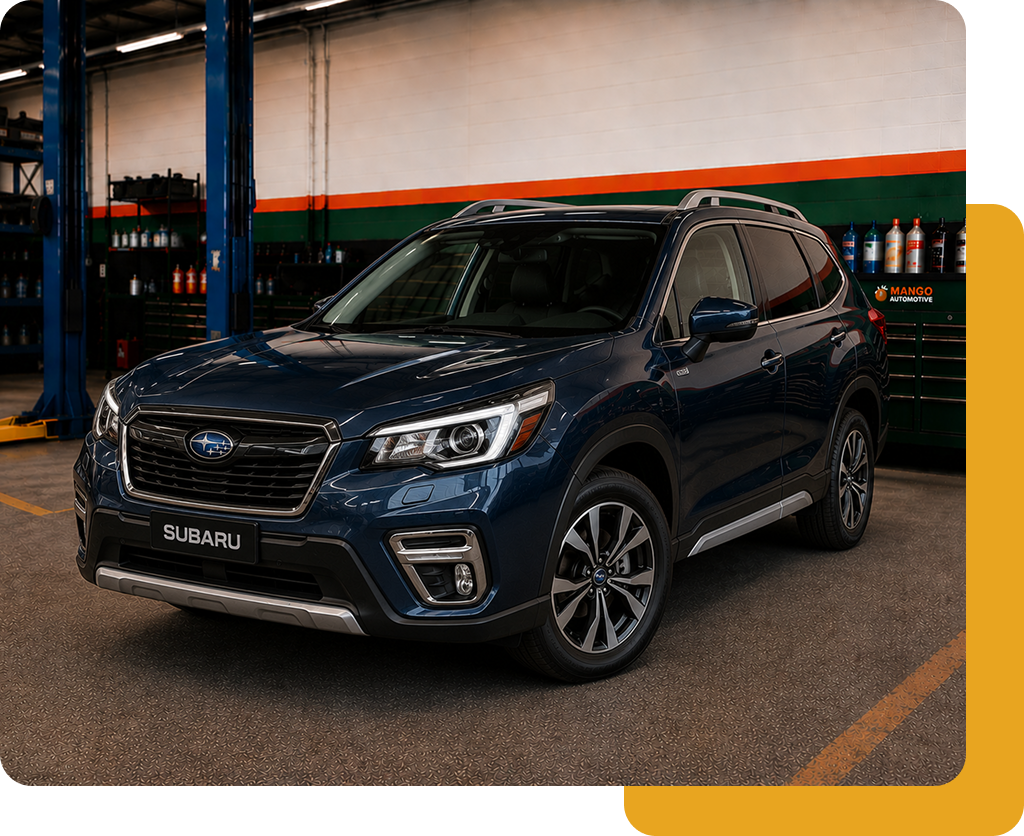 Dark blue SUV parked indoors near an orange-and-green wall