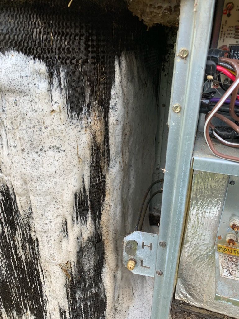 Cleaning An HVAC Unit — Emporia, VA — Sunrise Heating & Air Conditioning