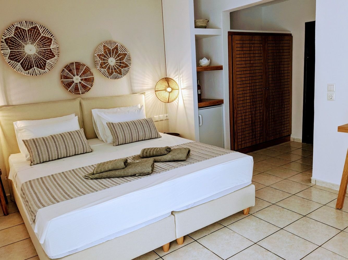 There is a large bed in the middle of the room.