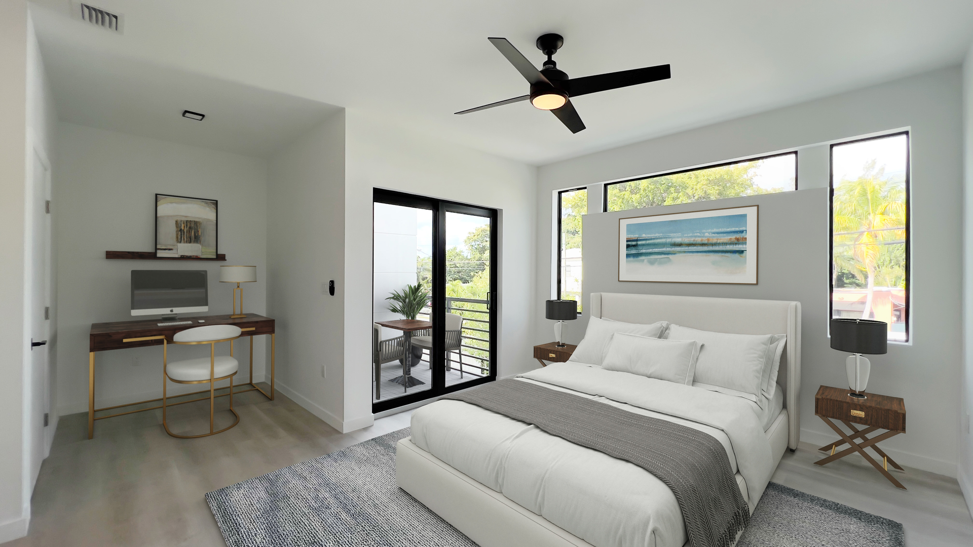 a bedroom with a large bed and a ceiling fan
