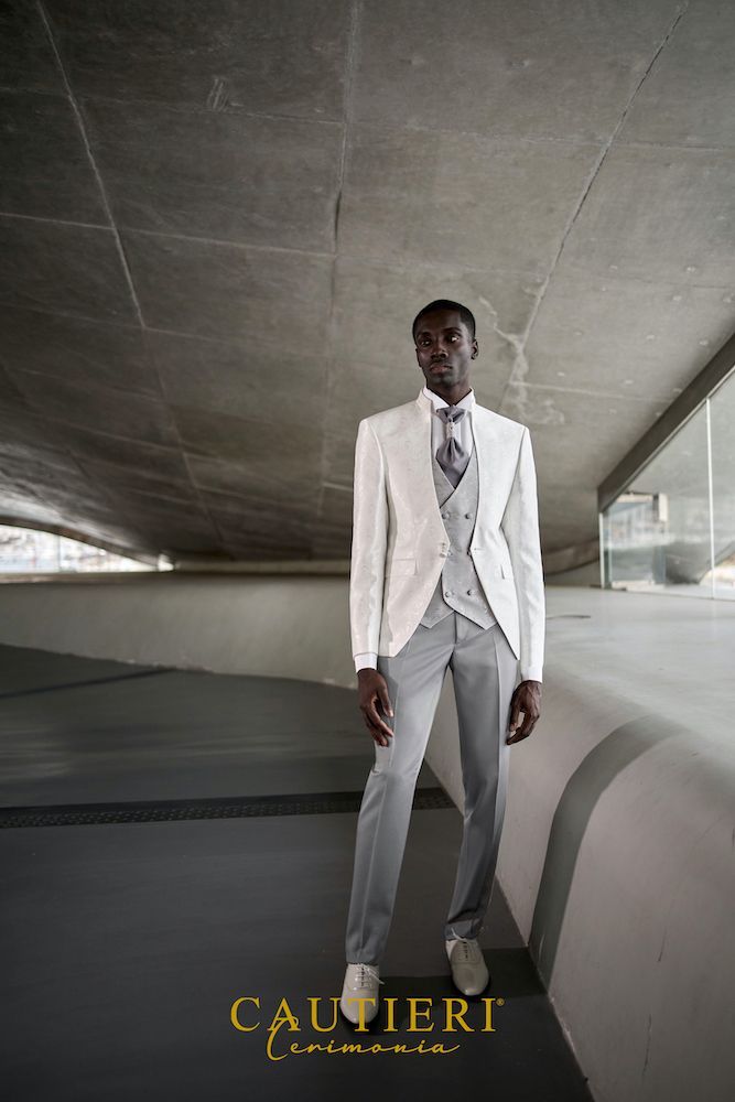 abito sposo bianco