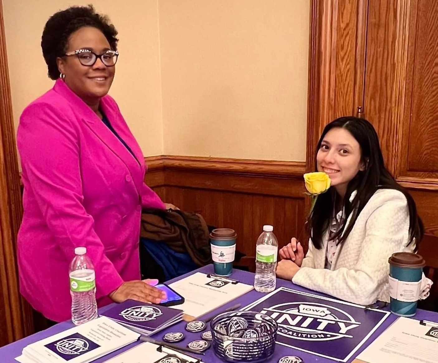 volunteers at at Iowa Unity Coalition table