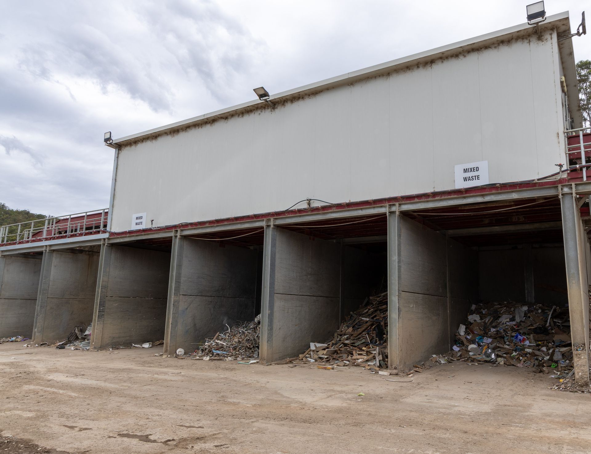 Waste Sorting Facility With Concrete Bin — Economy Waste Group | Skip Bins Central Coast In Saratoga, NSW