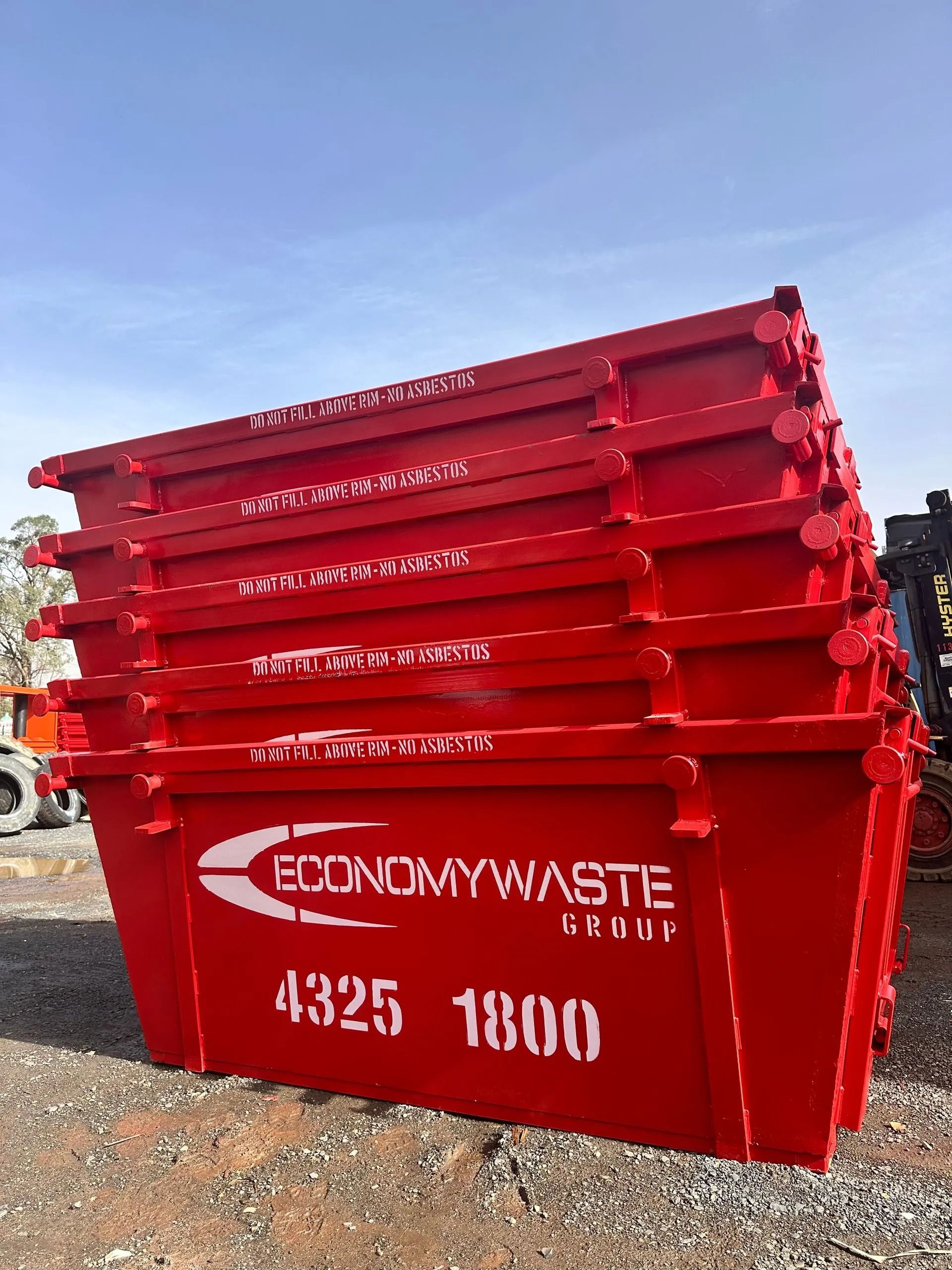 A Red Metal Waste Bins — Economy Waste Group | Skip Bins Central Coast In Killcare, NSW