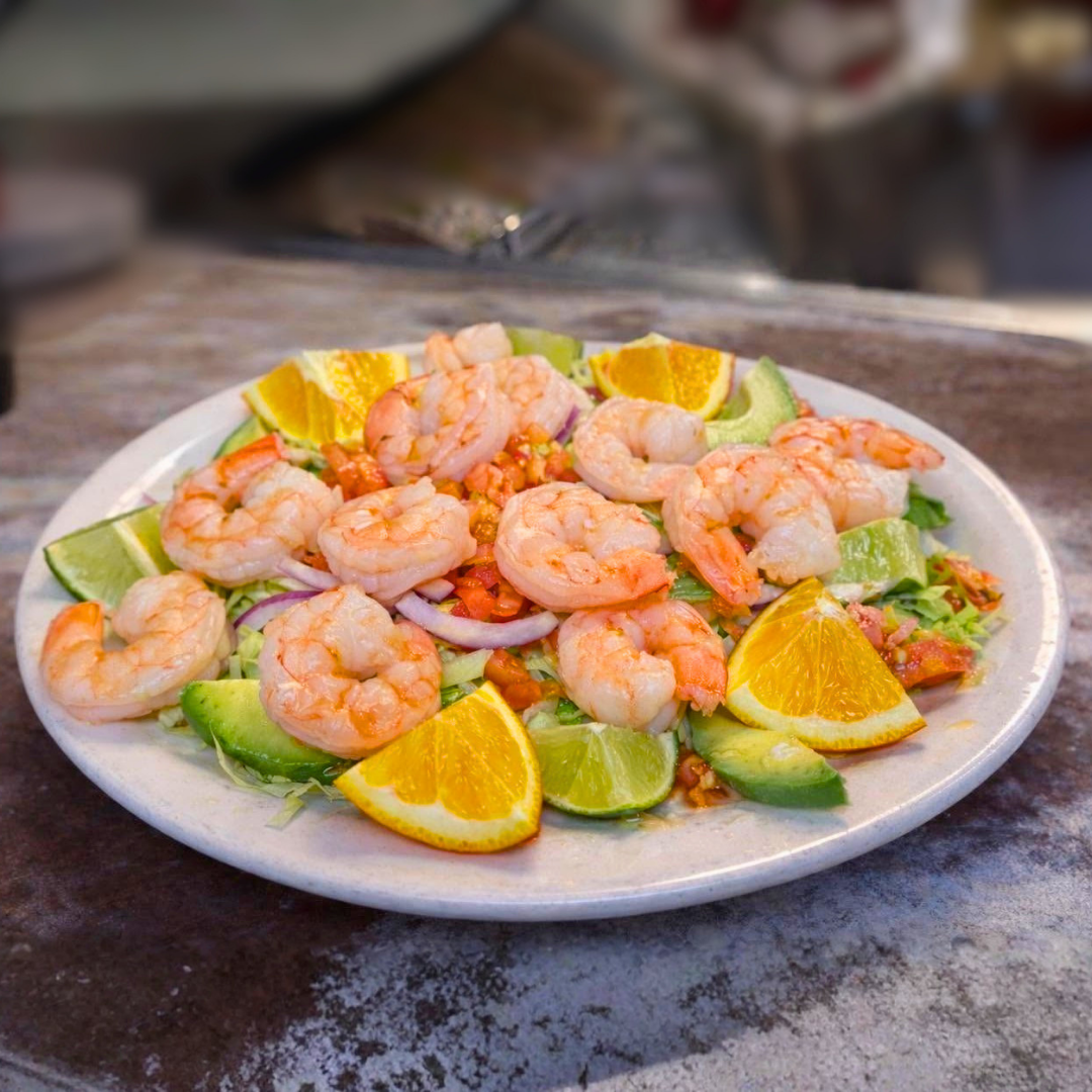 Shrimp Taco Salad - grilled shrimp with bell peppers, onions, tomatoes, cheese, sour cream, guacamole. Fresh, light, and flavorful Mexican salad.
