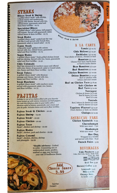 Restaurant menu page with steak dishes, prices, and a la carte options
