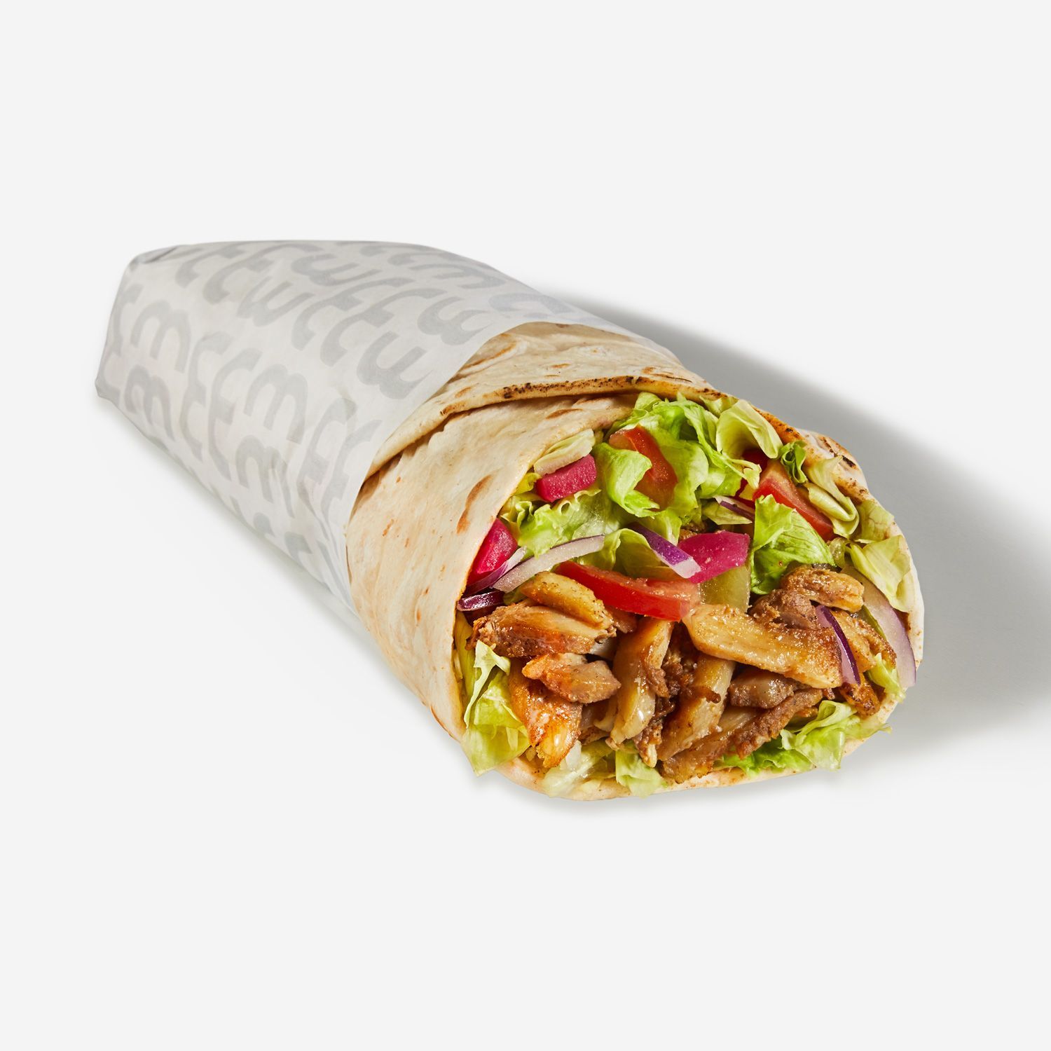 A wrap with meat and vegetables on a white background