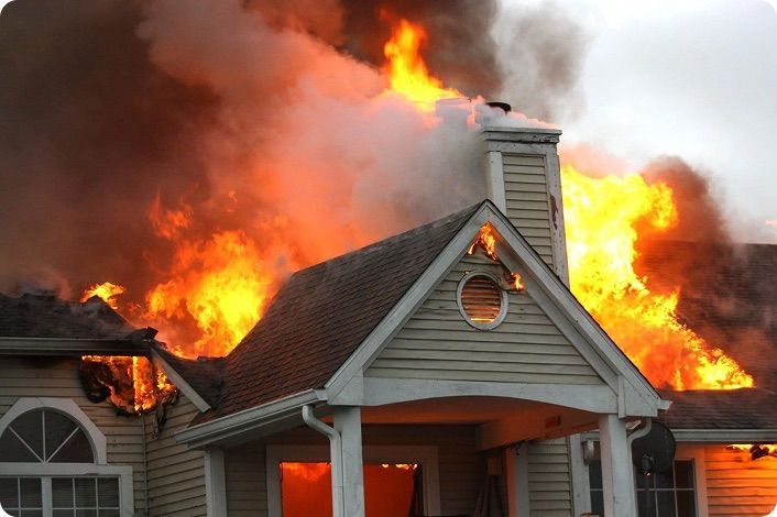 House engulfed in fire and smoke