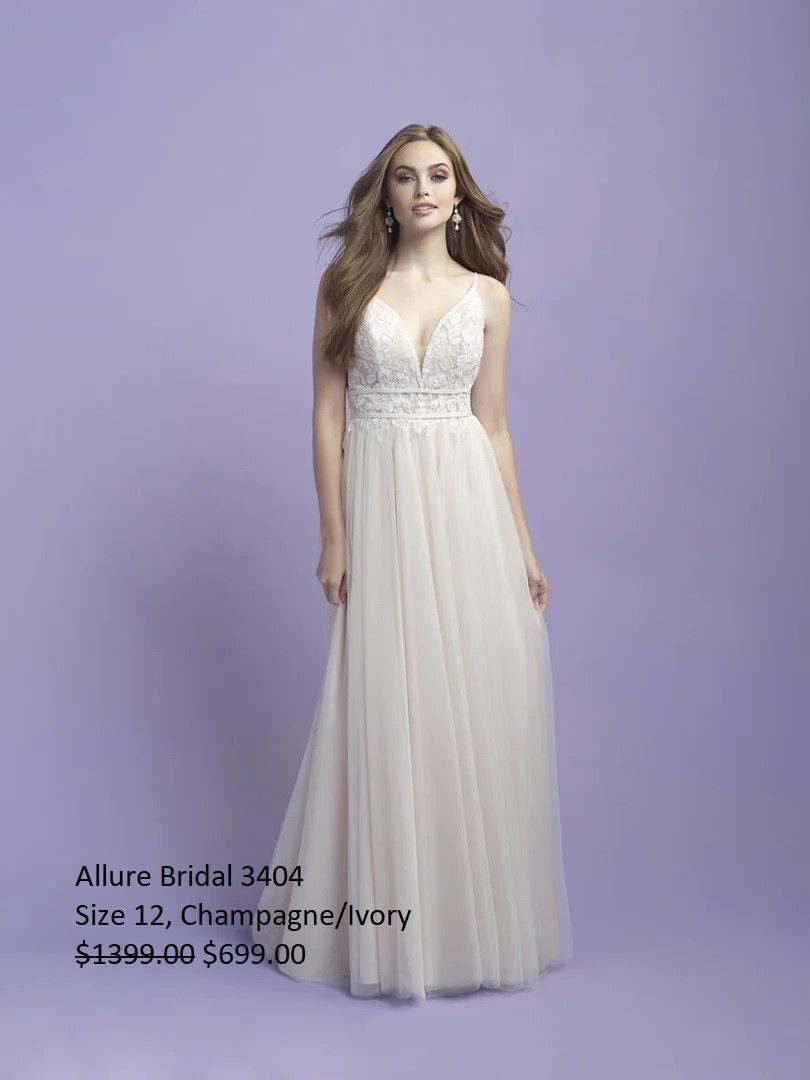 A woman in a white dress is standing on a purple background.