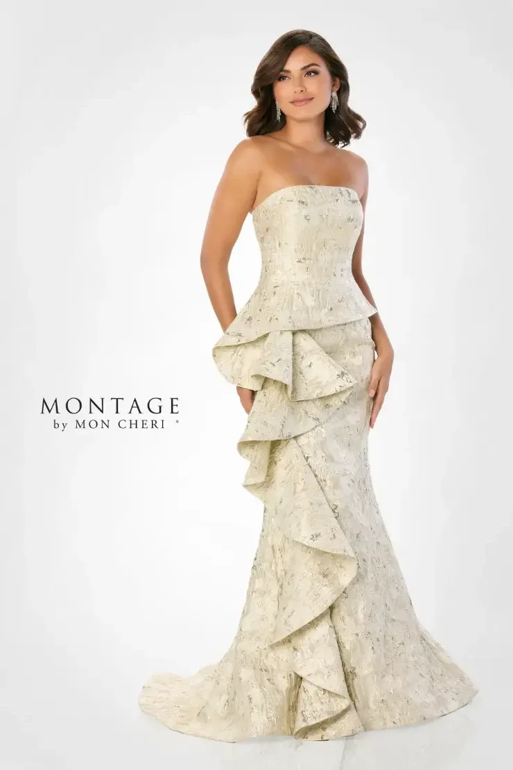 A woman is wearing a strapless dress with ruffles on the skirt.