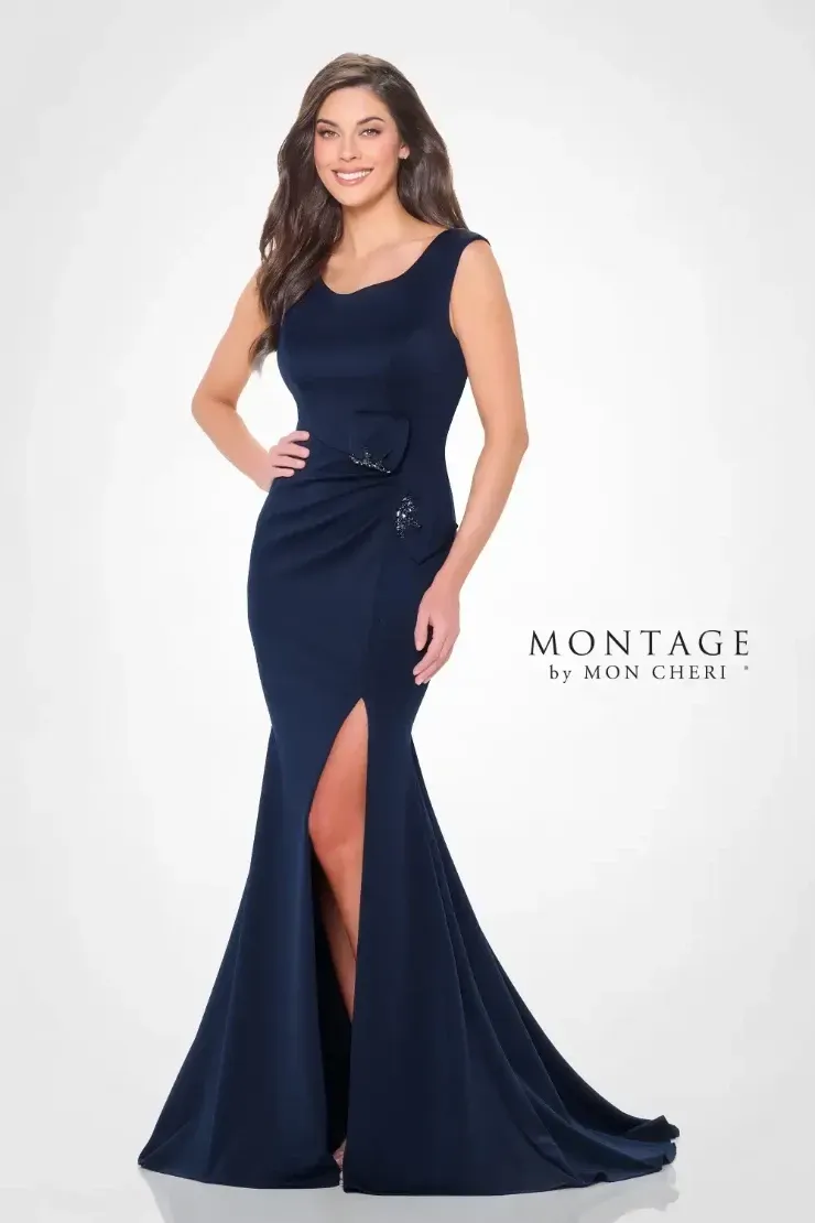A woman is wearing a long blue dress with a high slit