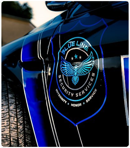 Blue Line Security Services logo on a black vehicle with blue accents