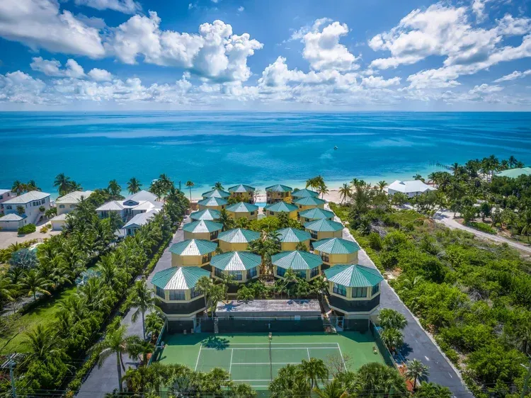 aerial view of property from street to ocean at Coco Plum Beach and Tennis Club and Marina in the Florida Keys