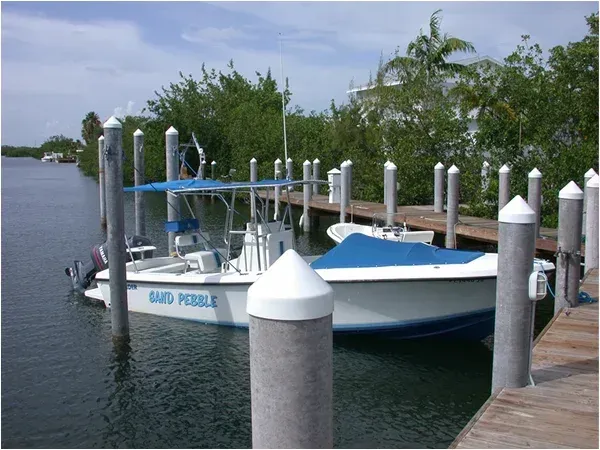 view of boat docked at property owned docking site at Coco Plum Beach and Tennis Club and Marina in the Florida Keys