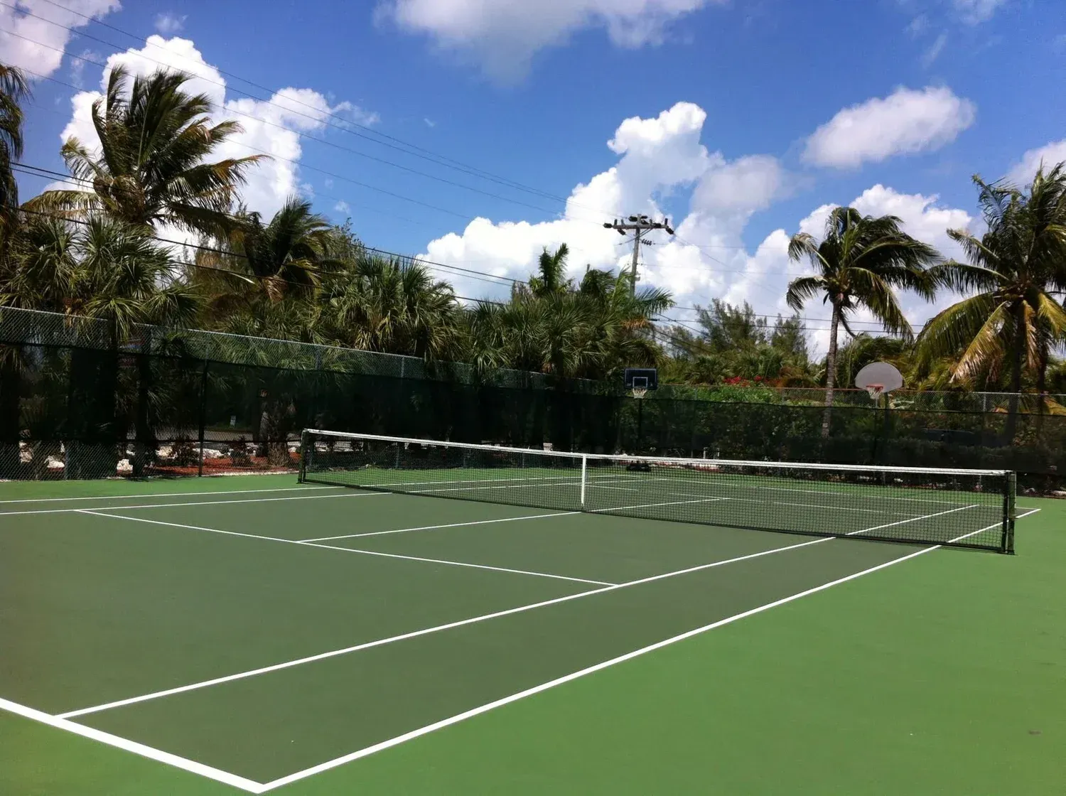 view of property tennis court at Coco Plum Beach and Tennis Club and Marina in the Florida Keys